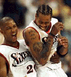 Injured 76ers Eek Out Win