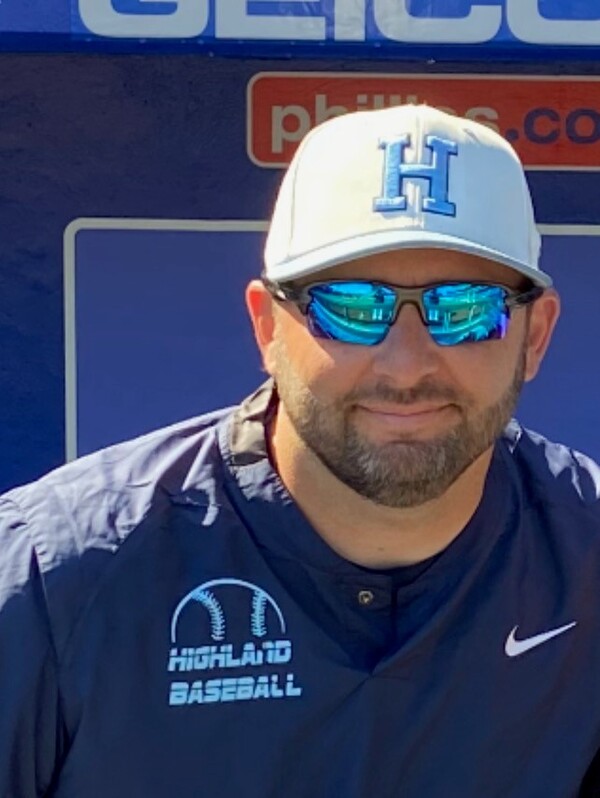 Highland baseball coach DJ Gore sets program record for wins